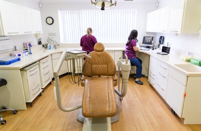 Dr Maria Rodrigues and assistant working at the Dental Implant Clinic